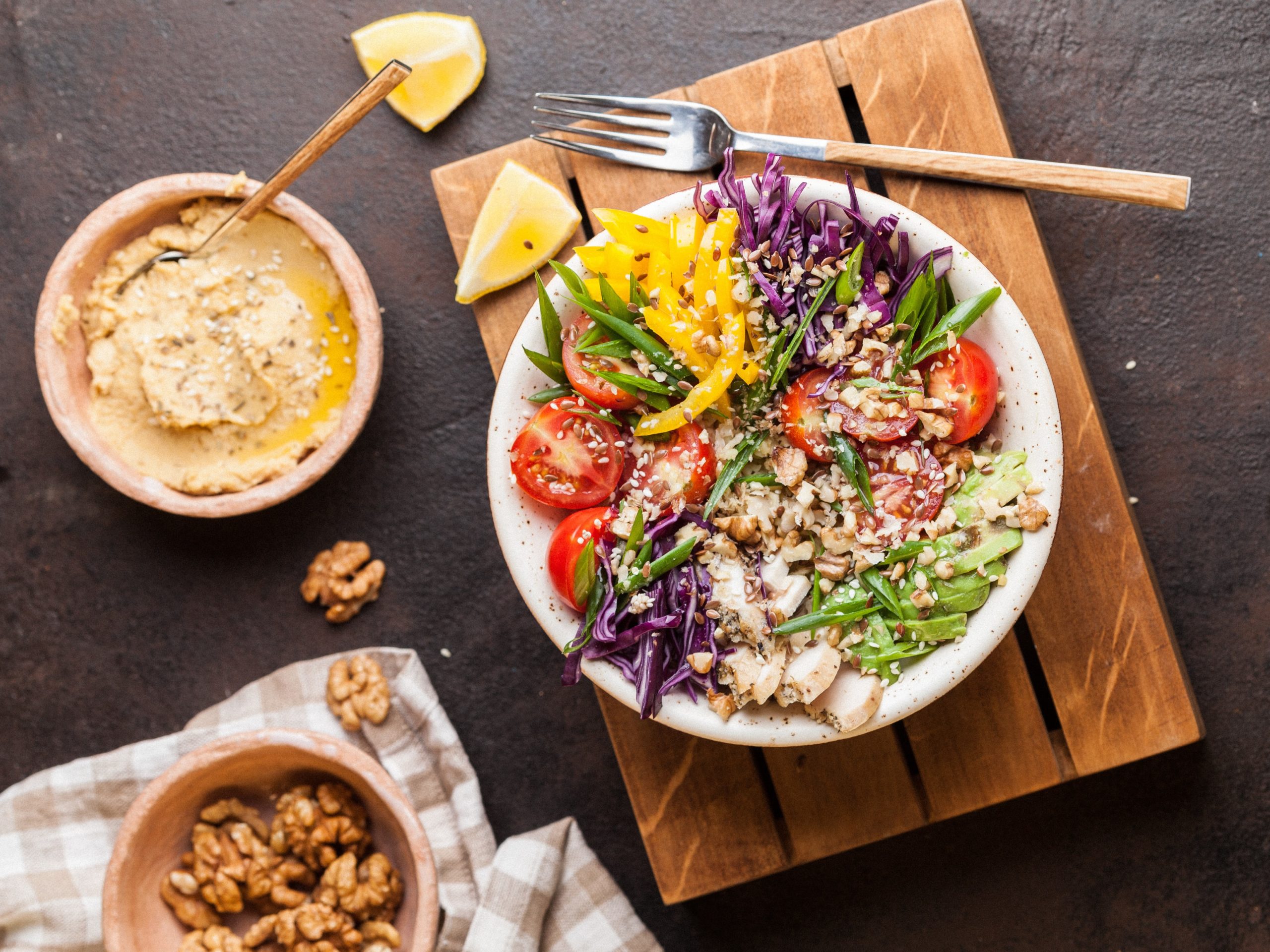 Fresh salad with hummas and walnuts